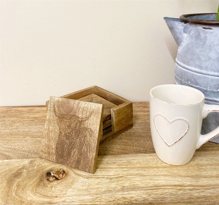 Ensemble en bois de 4 sous-verres de vache gravés