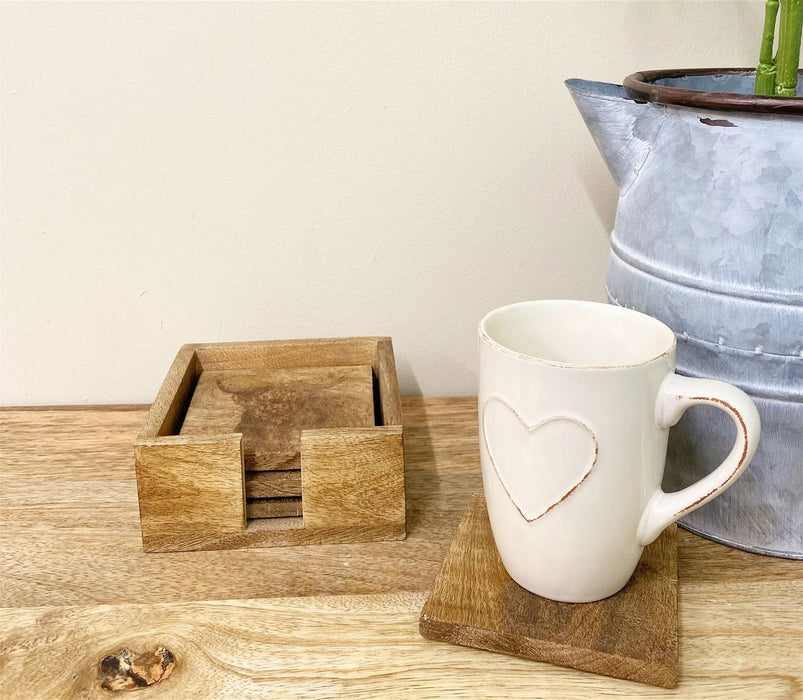 Ensemble en bois de 4 sous-verres de vache gravés